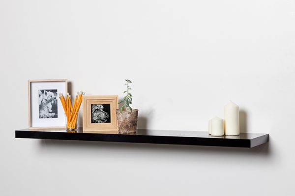 Flexi Storage Decorative Shelving Floating Shelf Black Gloss 1200 x 240 x 38mm fitted on wall with decorations on top