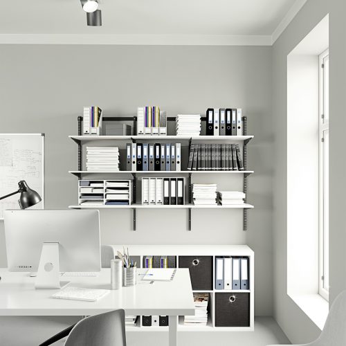 Flexi Storage Home Solutions Timber Shelf White 900x250x16mm mounted on Home Solutions Double Slot System and used as shelving in an office