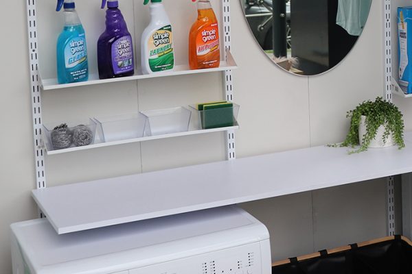 Flexi Storage Home Solutions Tray Shelf Plastic Tube Clear placed on Tray Shelf in laundry setup