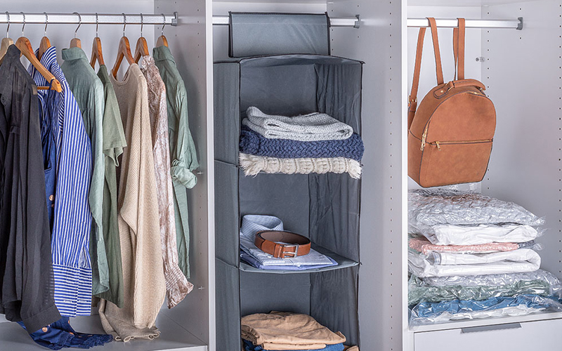 Flexi Storage Hanging Organiser and Vcauum Storage Bags used in a wardrobe